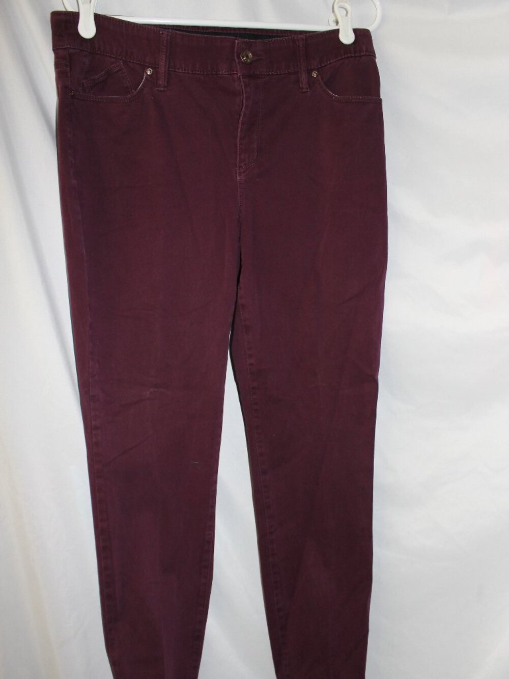 Chico's slim-leg denim pants in a deep burgundy